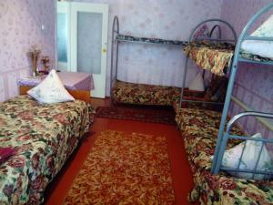 Кровать или кровати в номере Гостевой дом Костомарово