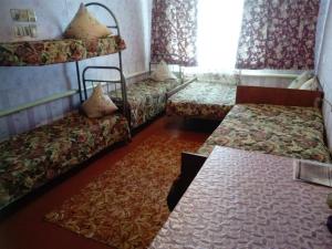 Кровать или кровати в номере Гостевой дом Костомарово