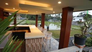 Ein Garten an der Unterkunft Darra Ria Villa Ubud