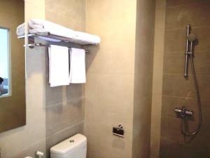 A bathroom at Java Village Resort by HOMEE Yogyakarta