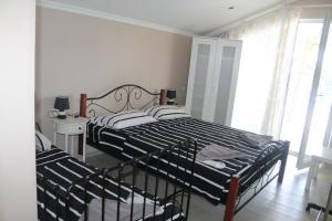 Letto o letti in una camera di Mana-Mana