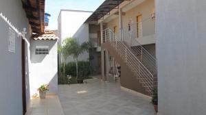 an empty hallway of a building with a staircase at Pousada Flor Dos Ipês in Trindade