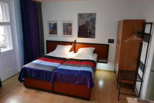 Postel nebo postele na pokoji v ubytování Rooms Bytom