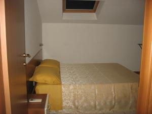 Posteľ alebo postele v izbe v ubytovaní Bed & Breakfast Bompadre