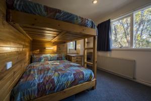 Postel nebo postele na pokoji v ubytování TERAMA Ski Lodge
