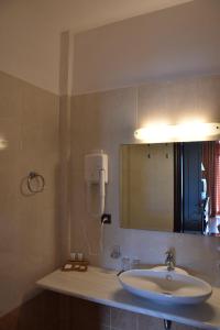 Kúpeľňa v ubytovaní Olvios Hotel + 37 fotografií