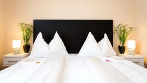 Stadthotel Kramer客房内的一张或多张床位