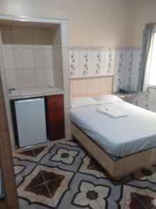 Postel nebo postele na pokoji v ubytování Hotel Val-de-Cans Aeroporto