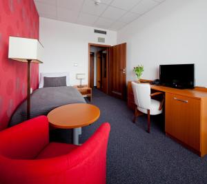TV a/nebo společenská místnost v ubytování Hotel Limba CTT