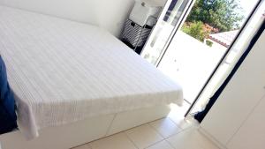 Cama ou camas em um quarto em Apartments House of Art