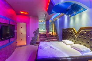 Letto o letti in una camera di Green Palace Hotel