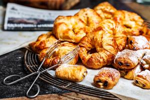 a bunch of croissants and pastries on a table at Radisson Blu Hotel, Liverpool in Liverpool