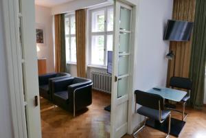 TV a/nebo společenská místnost v ubytování Rooms Bytom
