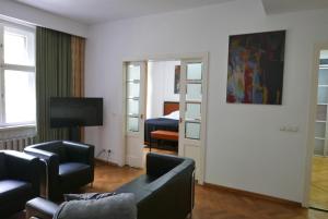 TV a/nebo společenská místnost v ubytování Rooms Bytom