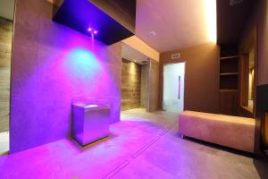 Łóżko lub łóżka w pokoju w obiekcie Hotel Concordia