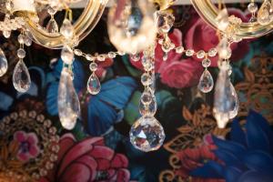 a bunch of crystals hanging from a chandelier at Boutiquehotel Villa Rosenhof in Badenweiler