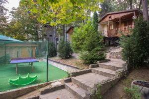 a house with a ping pong table in a yard at к-г Луна к-с Лонгоза комплекс Лонгоза in Byala