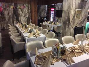 A seating area at Milano Hotel