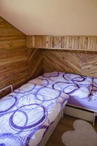 Postel nebo postele na pokoji v ubytování Penzion Iris