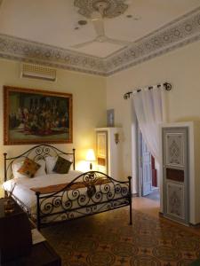 Postel nebo postele na pokoji v ubytování Riad Noos Noos & Spa