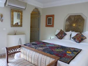 Postel nebo postele na pokoji v ubytování Riad Noos Noos & Spa