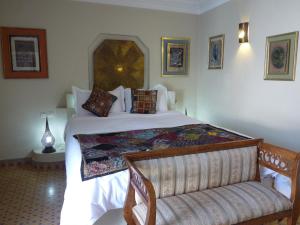 Postel nebo postele na pokoji v ubytování Riad Noos Noos & Spa
