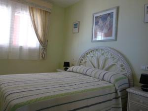 Postel nebo postele na pokoji v ubytování Apartamento En Daimus Con Vistas Al Mar + 7 fotografií