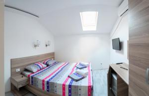 Postelja oz. postelje v sobi nastanitve Atina Lux Hostel