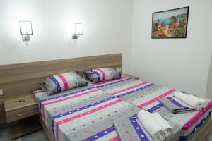 Postelja oz. postelje v sobi nastanitve Atina Lux Hostel