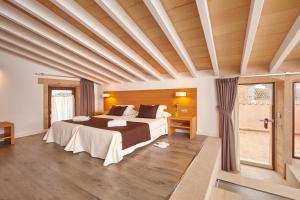 Postel nebo postele na pokoji v ubytování Bennoc Petit Hotel - Only Adults