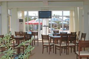 Un restaurante o sitio para comer en Sirin Villa