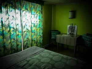 Postel nebo postele na pokoji v ubytování B&B De Eifelhoeve