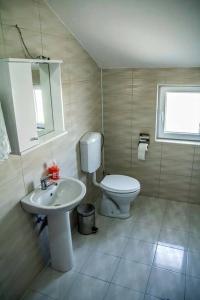 Koupelna v ubytování House La Strada