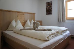 Postel nebo postele na pokoji v ubytování Ferienhaus Staudacher