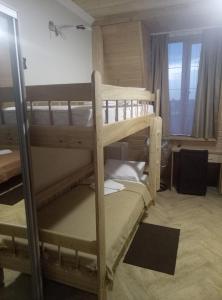 Postel nebo postele na pokoji v ubytování Dom Fedorovyh + 19 fotografií