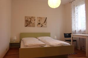 Postel nebo postele na pokoji v ubytování Haus Ilse & Karl Heinz