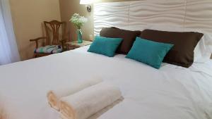 Ένα ή περισσότερα κρεβάτια σε δωμάτιο στο Hotel Las Calas