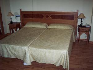 Postel nebo postele na pokoji v ubytování Castillo Lanjaron