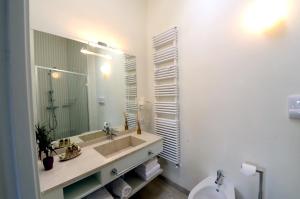 Koupelna v ubytování Aromi Piccolo Hotel