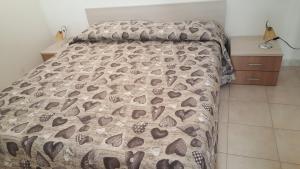 Postel nebo postele na pokoji v ubytování Appartamento Mariana