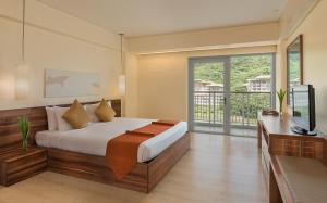 Voodi või voodid majutusasutuse Pico Sands Hotel toas