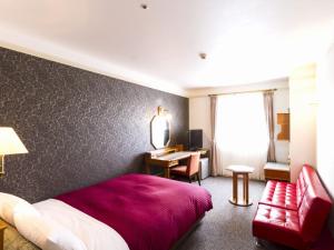 Postel nebo postele na pokoji v ubytování Hotel Merieges