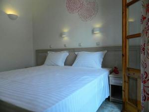 Postel nebo postele na pokoji v ubytování Armyra Hotel