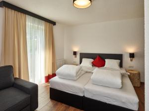 A bed or beds in a room at A CASA Opal Appartements