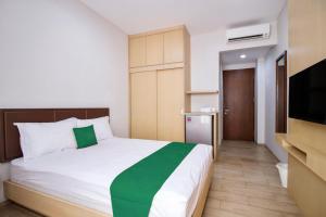 Postel nebo postele na pokoji v ubytování Mk House Scbd + 30 fotografií
