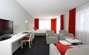 TV a/nebo společenská místnost v ubytování Hotel Steinmattli