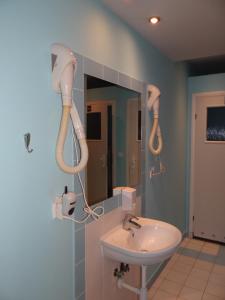 Kúpeľňa v ubytovaní Sentymentalne Kościelisko Apartament & SPA + 17 fotografií