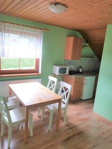 Kuchyň nebo kuchyňský kout v ubytování Apartmány Sára