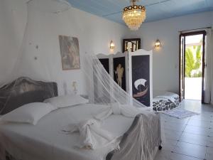 Postel nebo postele na pokoji v ubytování Villa Mantalena