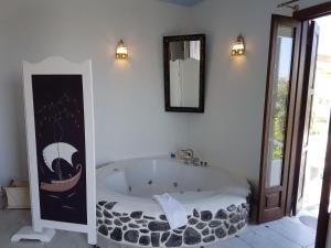 Postel nebo postele na pokoji v ubytování Villa Mantalena